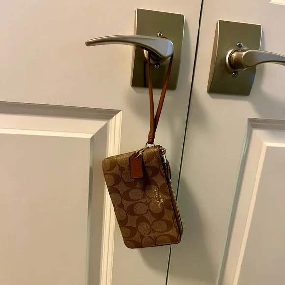 Coach Wristlet in Signature Canvas. - Picture 7 of 10